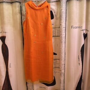 Silk dress wore to wedding.  Very head turning.  Pretty color